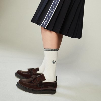 FRED PERRY Holding acquisisce George Cox